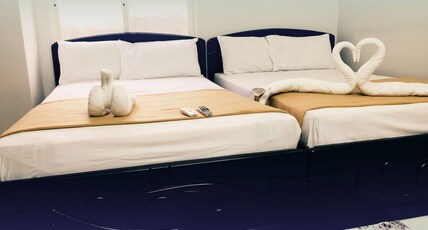 Sai Palace Inn Room Type - Deluxe Rooms AC
