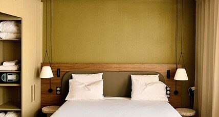 Novotel Suites Clermont Ferrand Polydome Room Type - Superior bedroom suite with 1 double size bed and sofa