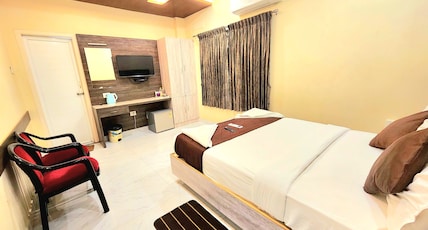 Udhayam Inn Room Type - Double occupancy Executive Air-Condioned(1 QUEEN SIZE BED) Udhayam Inn Room Type - Double occupancy Executive Air-Condioned(1 QUEEN SIZE BED)