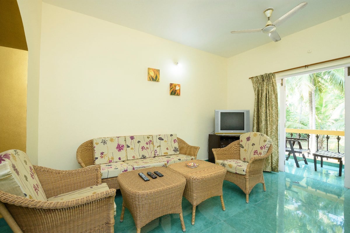 Dona Karen | 2 BHK Pool-facing Apartment - Tap to explore photos