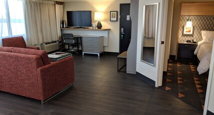 Holiday Inn CHAMPAIGN Room Type - 1 King One Bedroom Suite with Sofa Bed Holiday Inn CHAMPAIGN Room Type - 1 King One Bedroom Suite with Sofa Bed