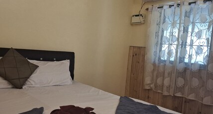 AVE MARIA GUEST HOUSE Room Type - Deluxe Non AC Room
