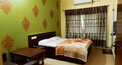 Hotel Manorma Palace Room Type - Deluxe Double Room AC