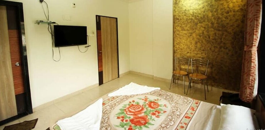 Hotel Pranav Executive (Near Swarget), Pune - Tap to explore photos