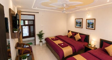 HOTEL DEVLOK Room Type - triple bed room with hill view