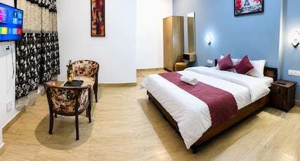 Hotel Snow Crest Residency  | A Pure Veg Hotel Room Type - Deluxe Room With Balcony