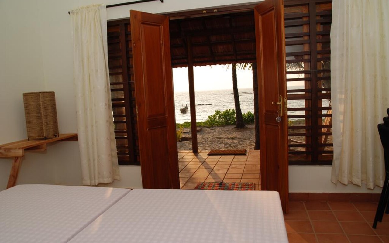 Chera Rock Beach House,Kannur - Tap to explore photos