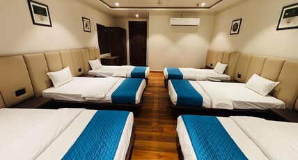 Grand Dularia, Banquet Hotel Room Type - Family Room Dormitory with City View King Bed Grand Dularia, Banquet Hotel Room Type - Family Room Dormitory with City View King Bed