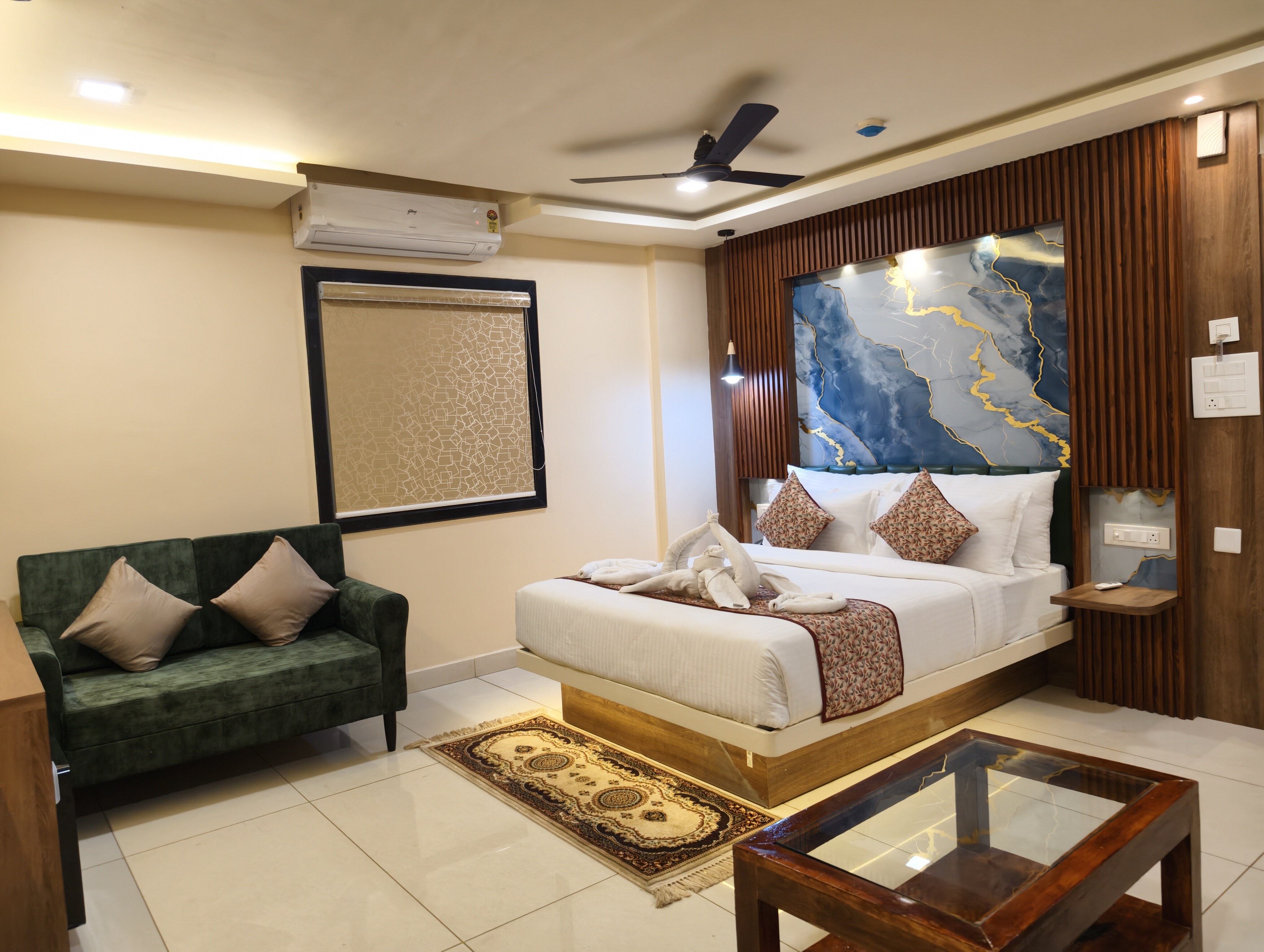 Hotel JCN Comforts - Tap to explore photos