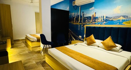 HolidayVilla Amritsar| Luxury Rooms & Suites Room Type - Premium Quad Room for 4 , Common Modular Kitchen and Lobby