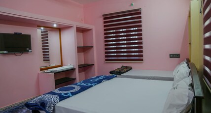 Magil Guest House Room Type - Triple Bedroom AC