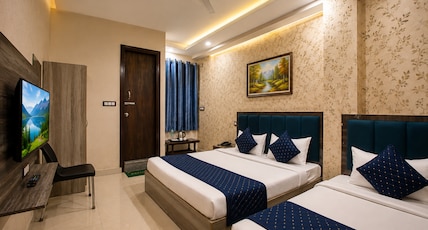 Hotel Popular Suites near IGI Airport Room Type - TRIPLE Bedroom(1Double 1Singal Bed) Hotel Popular Suites near IGI Airport Room Type - TRIPLE Bedroom(1Double 1Singal Bed)