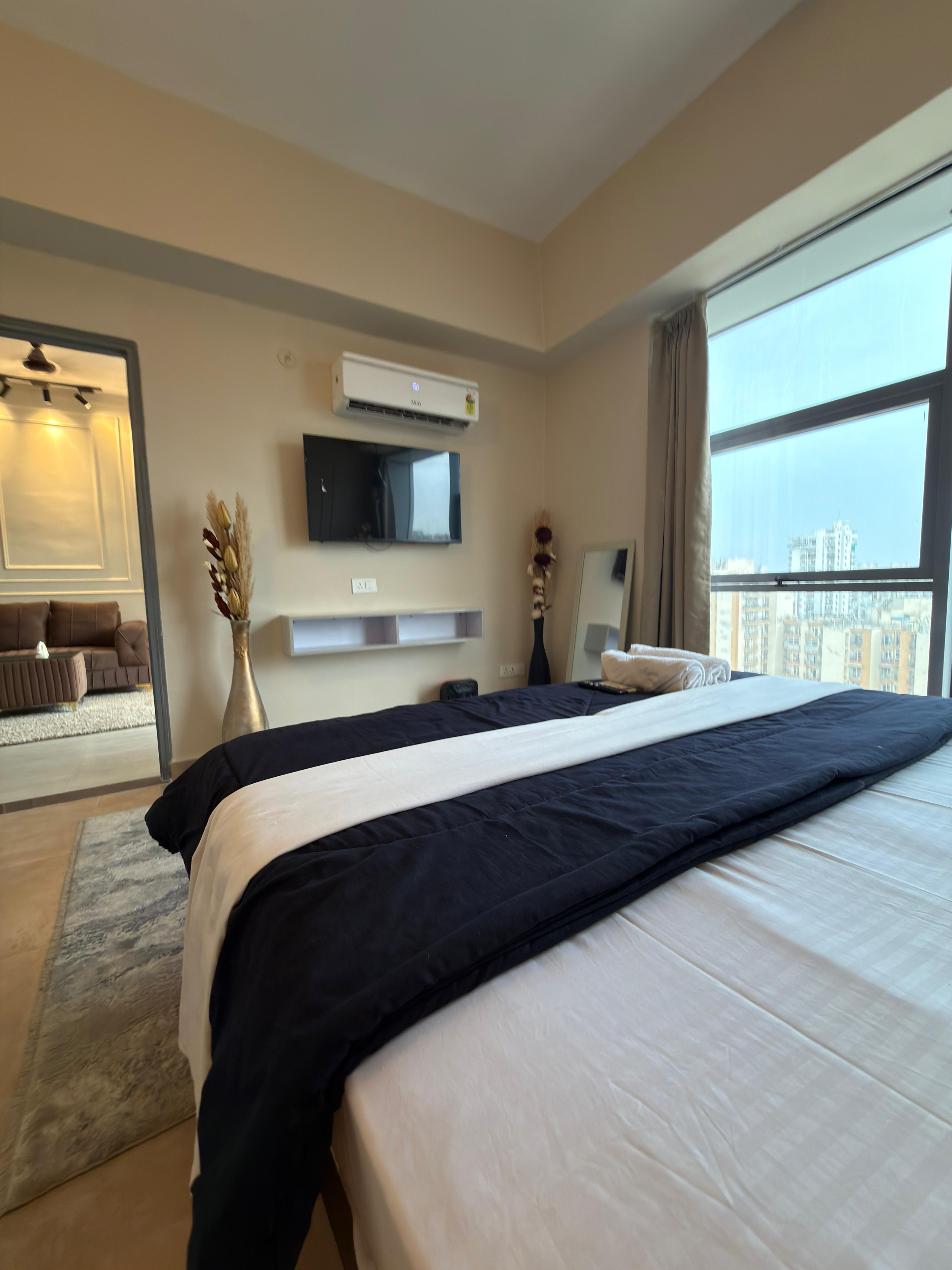 Modern Classic 1BHK Luxury Suite with Balcony - Tap to explore photos