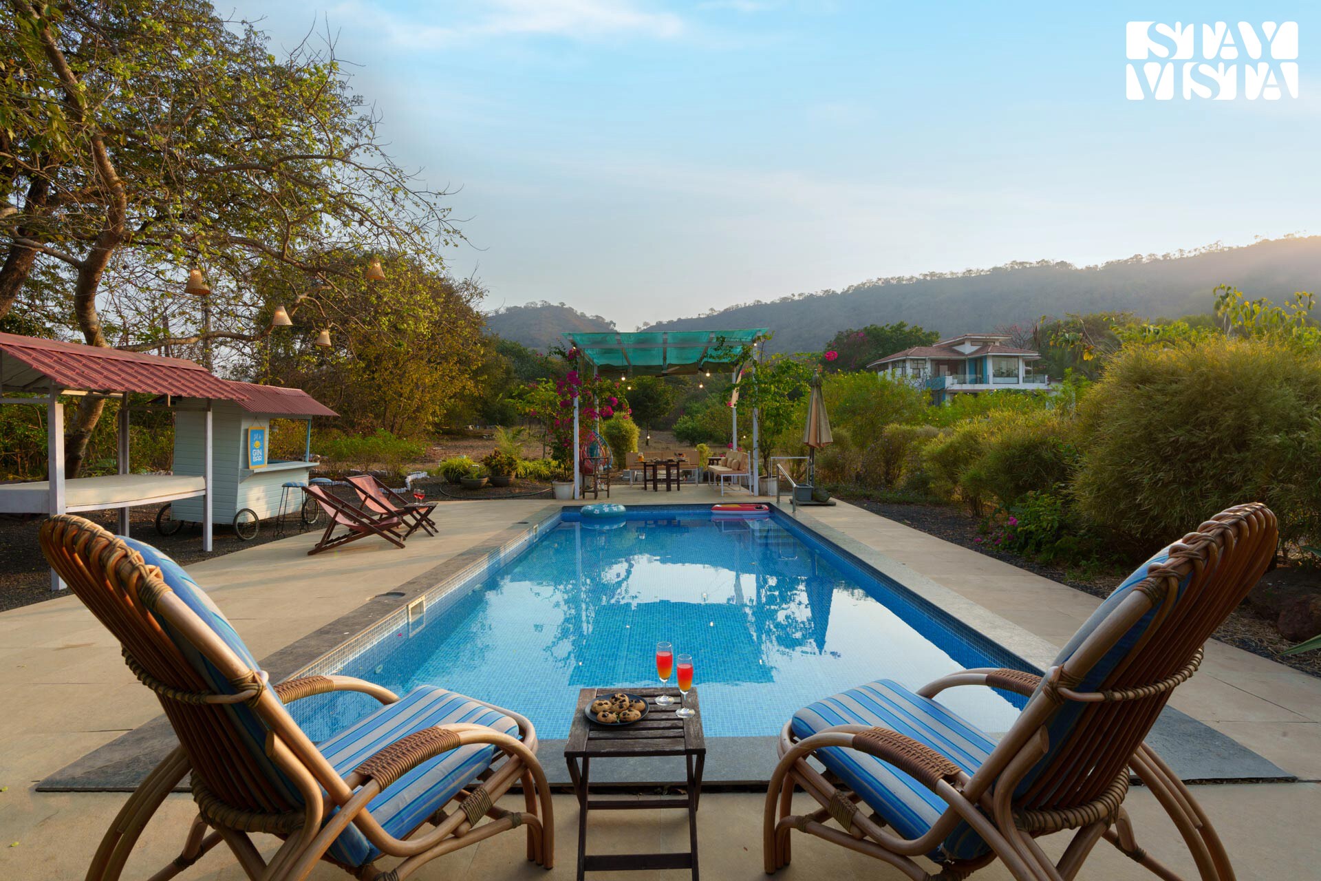 StayVista | 4 BHK House Below The Hill - Tap to explore photos