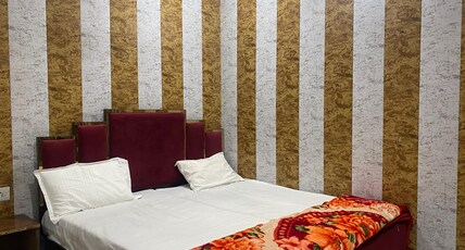 BAJRANG BALI GUEST HOUSE Room Type - DELUXE ROOM