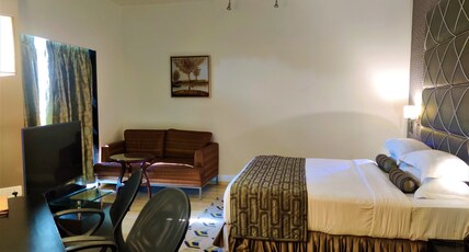Satkar Residency Room Type - Deluxe Room