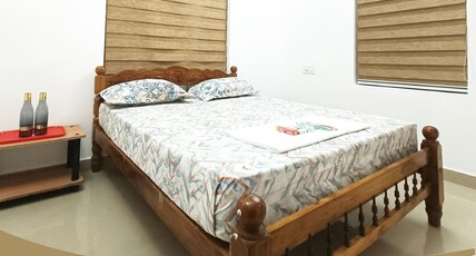 Poonkavanam Gust House Room Type - AC DOUBLE ROOM ( Hourly )