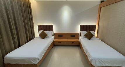 Aruna Ragha Room Type - Studio with Twin Bed Room