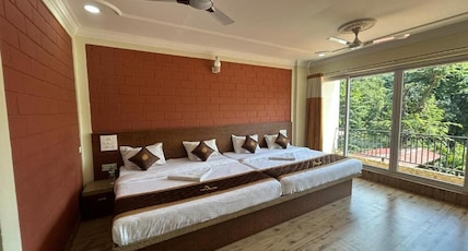Hotel Parijatha Inn Room Type - 4 OCCUPANCY AC With Balcony Hotel Parijatha Inn Room Type - 4 OCCUPANCY AC With Balcony