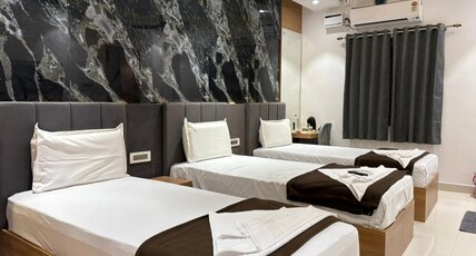 SHREE RESIDENCY Room Type - Deluxe Triple AC Room