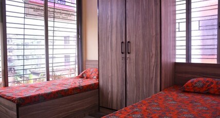 Maha Lakshmi Guest House Room Type - AC room with common toilet