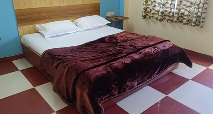 Ooty Travelers Lodge  Room Type - Bedroom 11