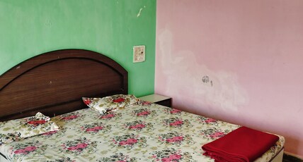 HOTEL GURUJI Room Type - AC Couple Room (2 Person)