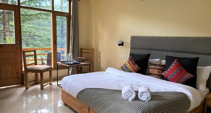 Getaway Stays Manali | River-view Rooms Room Type - King Room With River and Mountain View