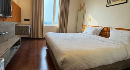 Janki Inn Room Type - Delux Room