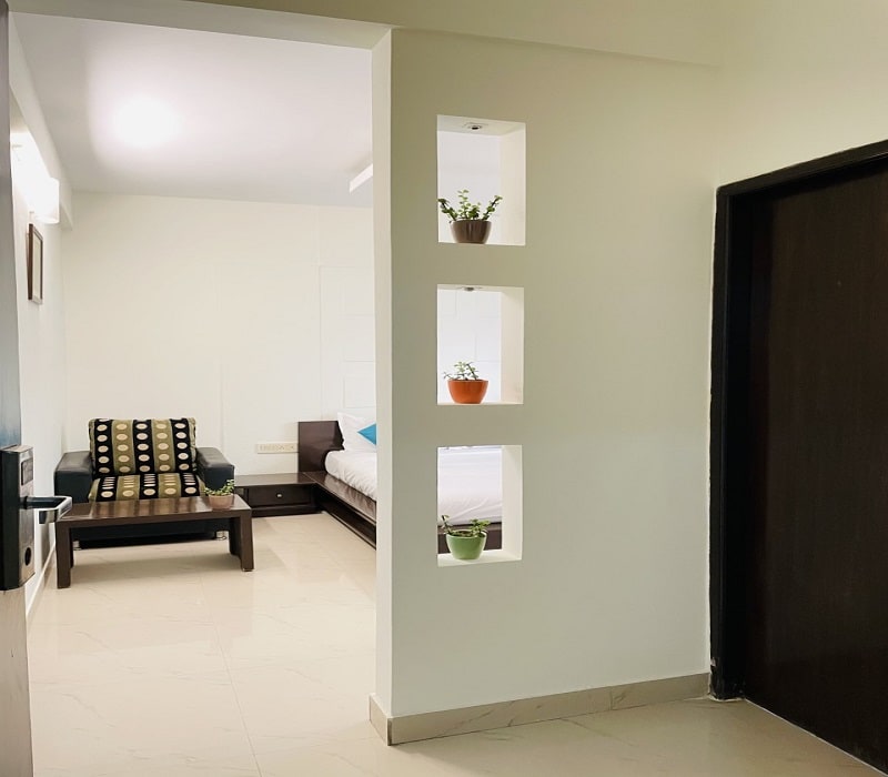 Sanctum Suites Domlur Bangalore - Tap to explore photos