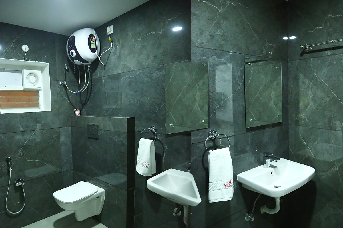 Hotel Sushmitha Inn - Tap to explore photos