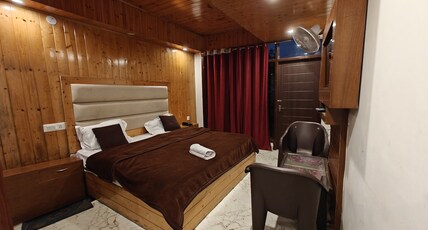 Anand Plaza Room Type - Executive Room with Balcony & Forest View Anand Plaza Room Type - Executive Room with Balcony & Forest View