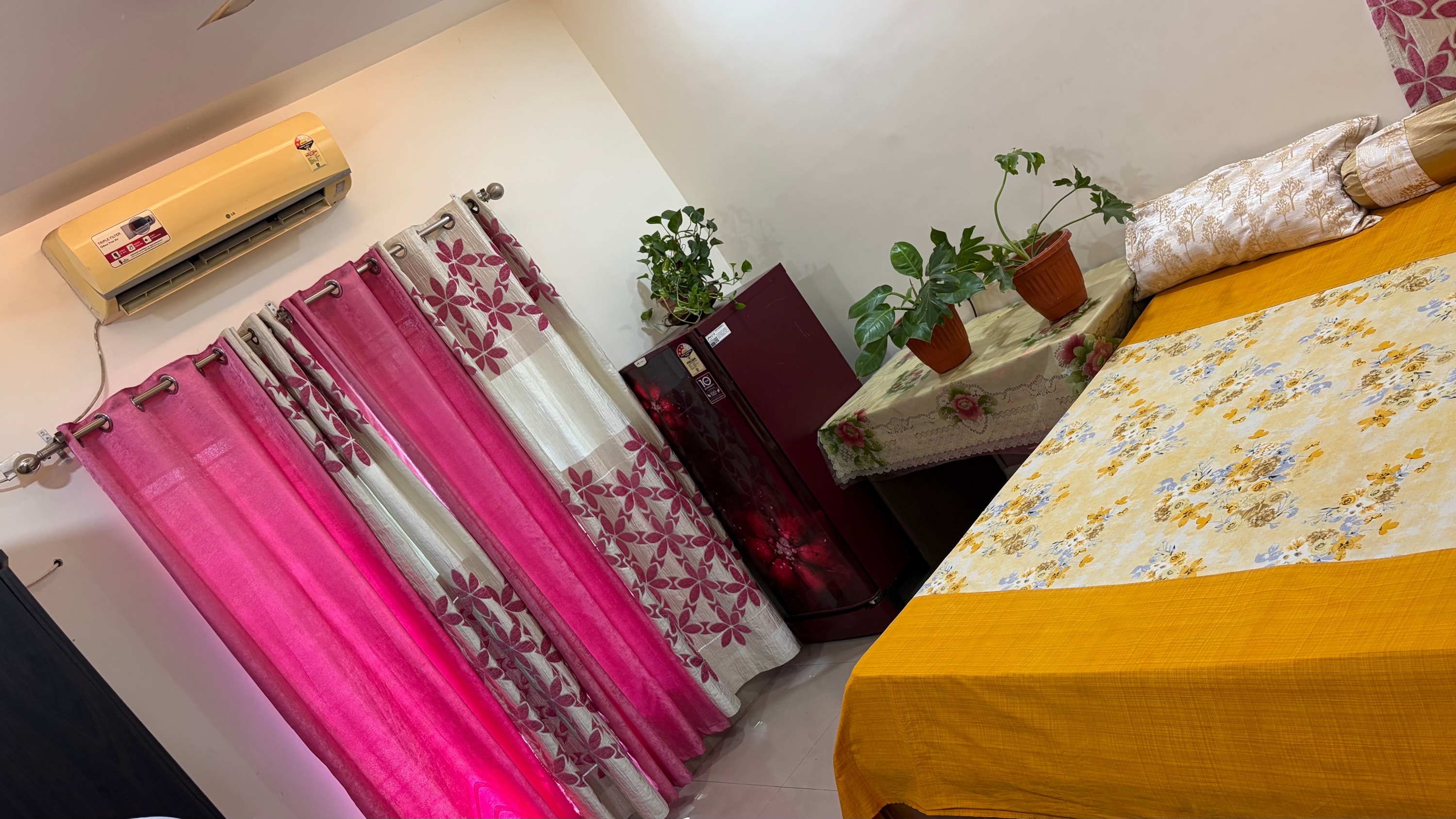 Eastern Bedroom with separate refrigerator - Tap to explore photos