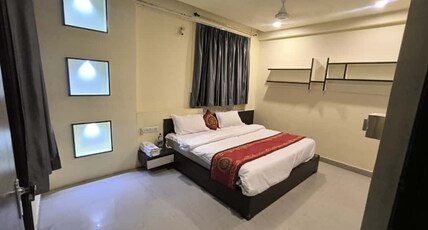 Shreenathji Inn Room Type - Super Deluxe Room