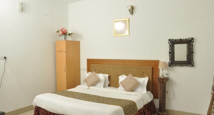 Vikramgarh Lakeview at Fatehsagar| Infinity Pool and Sitout  Room Type - Standard Room with Balcony and Garden View