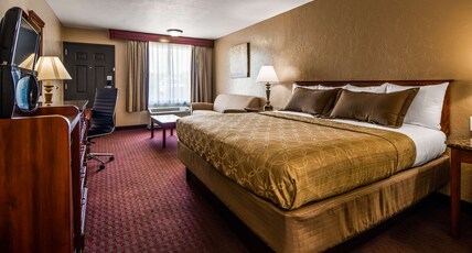 BEST WESTERN EL RENO Room Type - 1 King Bed, Non-Smoking, Upstairs, Oversized Room, Walk In Shower, Sofabed, Microwave And Refrigerat BEST WESTERN EL RENO Room Type - 1 King Bed, Non-Smoking, Upstairs, Oversized Room, Walk In Shower, Sofabed, Microwave And Refrigerat