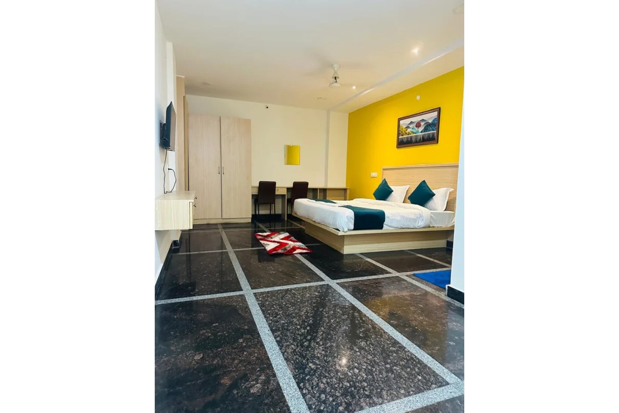 FabHotel Living Tree Suites - Tap to explore photos