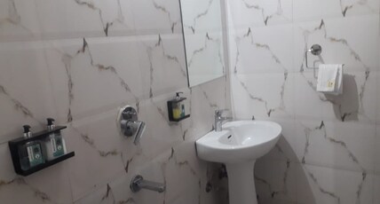 Hotel Metro Inn Room Type - Deluxe Four bed AC Room