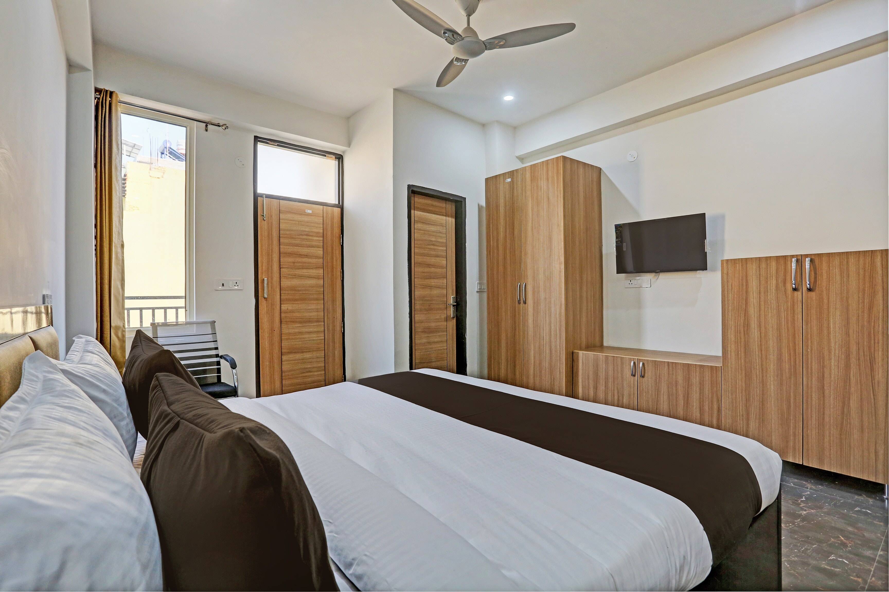 Hotel O Star Corporate Suite - Tap to explore photos