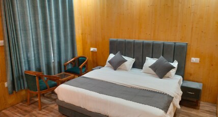 Harsil woodstone homestay Room Type - Deluxe suite