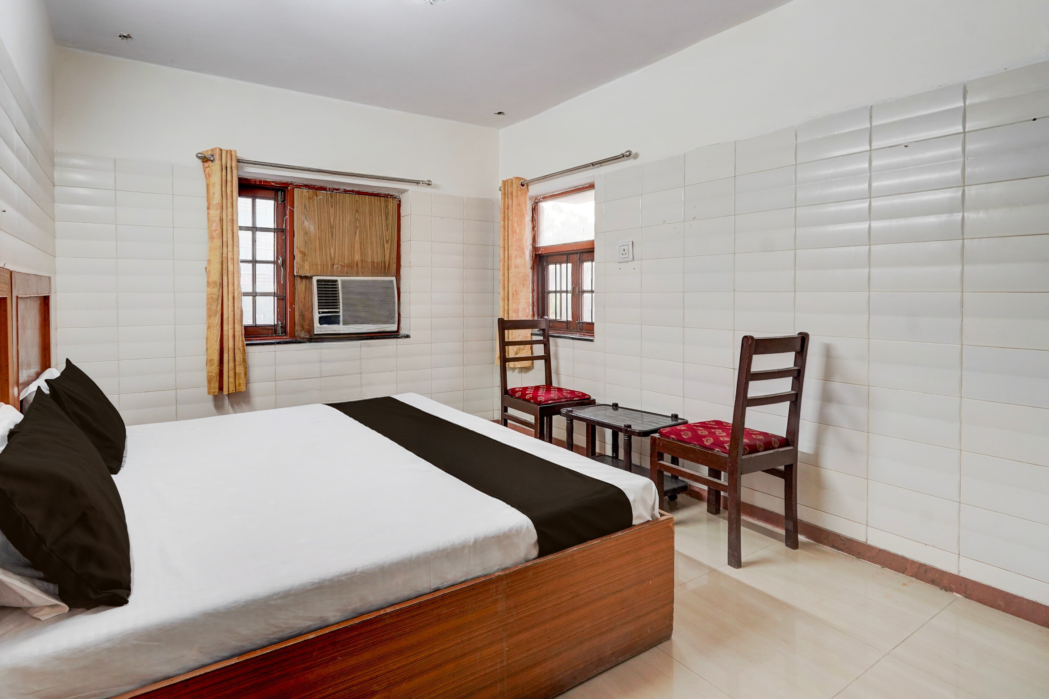SPOT ON by OYO Dn Hotel - Tap to explore photos