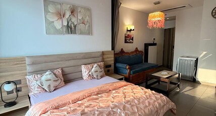 Riverfront in Heart of Noida by Luxury Heights Room Type - River View and City View Bedroom