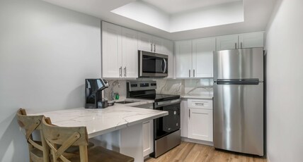 Best Western Plus Beach Resort Room Type - Accessible - Suite 2 Queen, Mobility Accessible, Roll In Shower, Ground Floor, Sofabed, Non-Smoking,