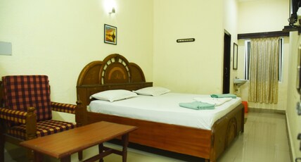 Triveni Tourist Home Room Type - Deluxe Double Non AC