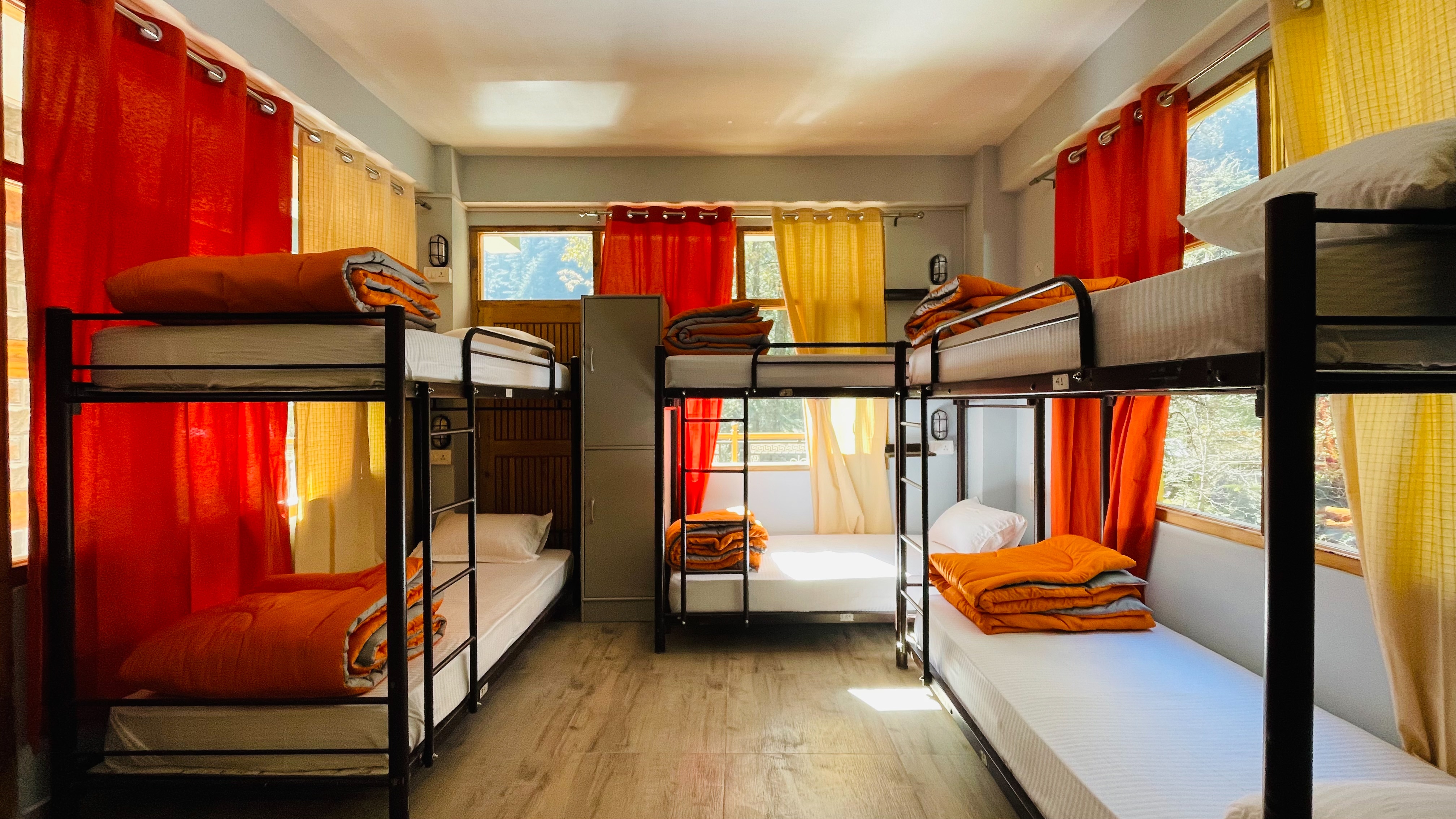 Madpackers Jibhi | Hostel by the River - Tap to explore photos