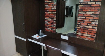 Aamba Residency Room Type - DELUXE AC QUEEN ROOM