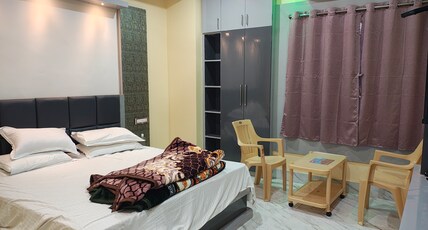 Sneha Residency Room Type - AC Deluxe Room