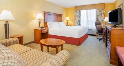 Holiday Inn Express Hotel & Suites Bloomington Room Type - 1 King Suite Sofa Bed Holiday Inn Express Hotel & Suites Bloomington Room Type - 1 King Suite Sofa Bed