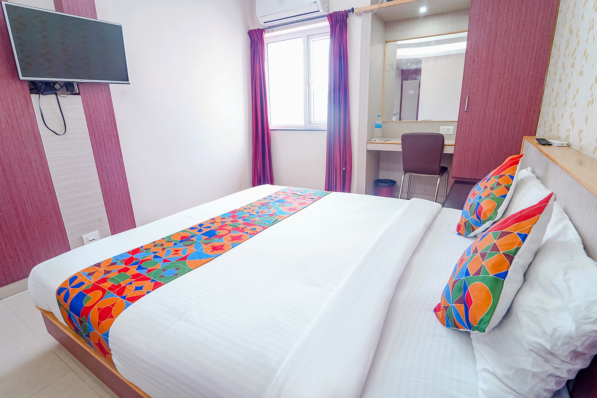 FabHotel Grand Gunas - Tap to explore photos
