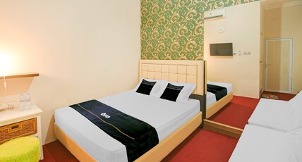 OYO 94669 Hotel Puri Inn Panakkukang Makassar Room Type - Indonesia Deluxe Double